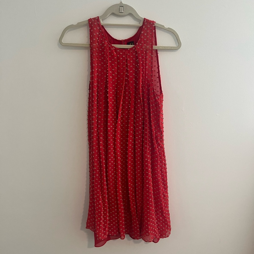 Anthropologies red dress with pleat and pattern detailing